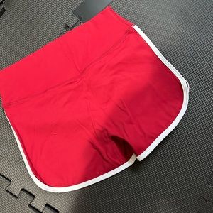 Violate the dress code red shorts